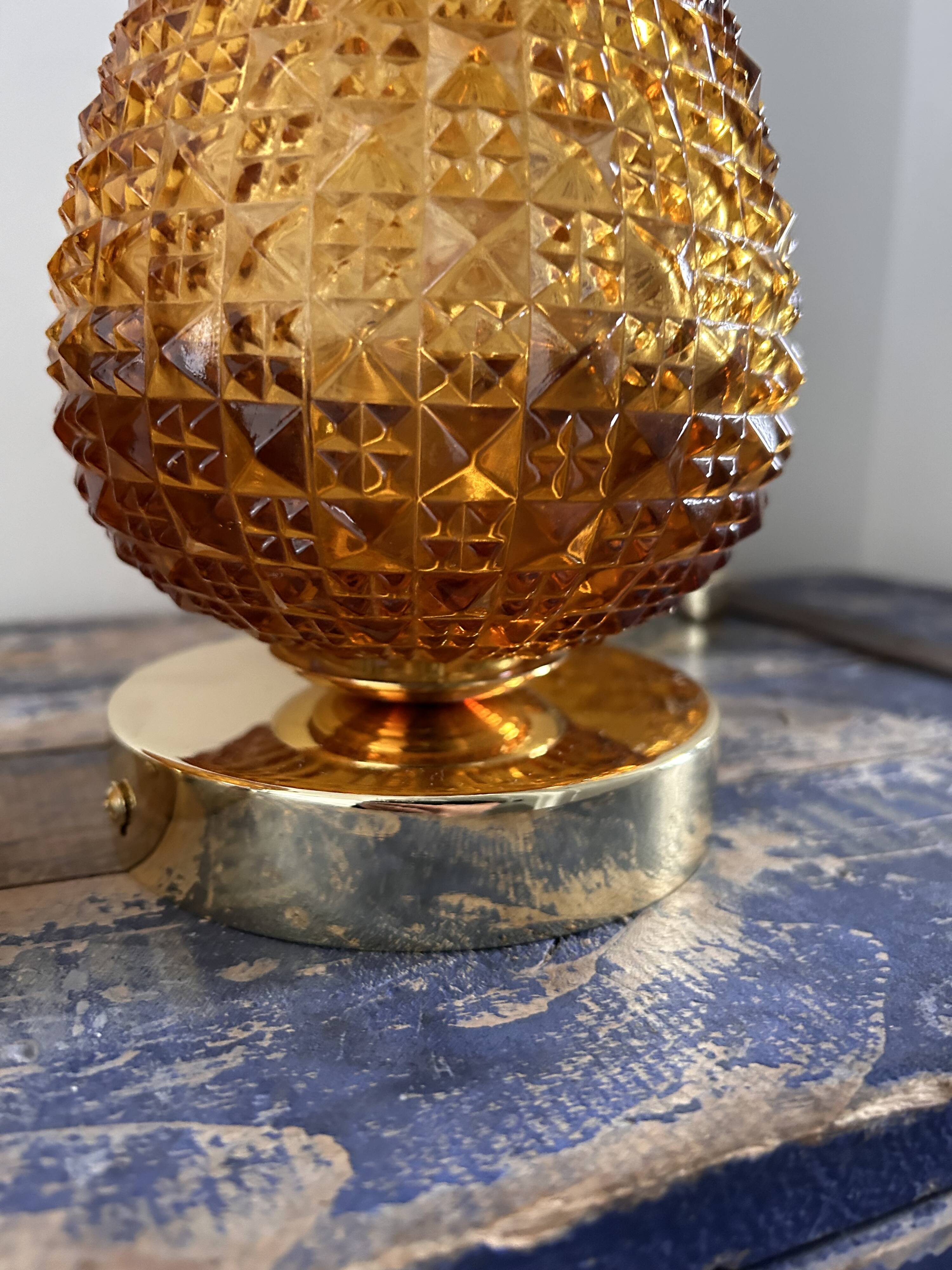 Set of three vintage wall or ceiling lights in amber chiseled glass