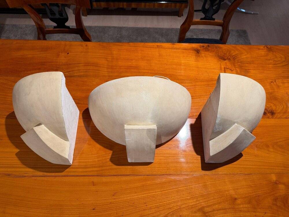 Art Deco wall lights in patinated plaster, France, 1925, set of 3