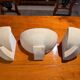 Art Deco wall lights in patinated plaster, France, 1925, set of 3