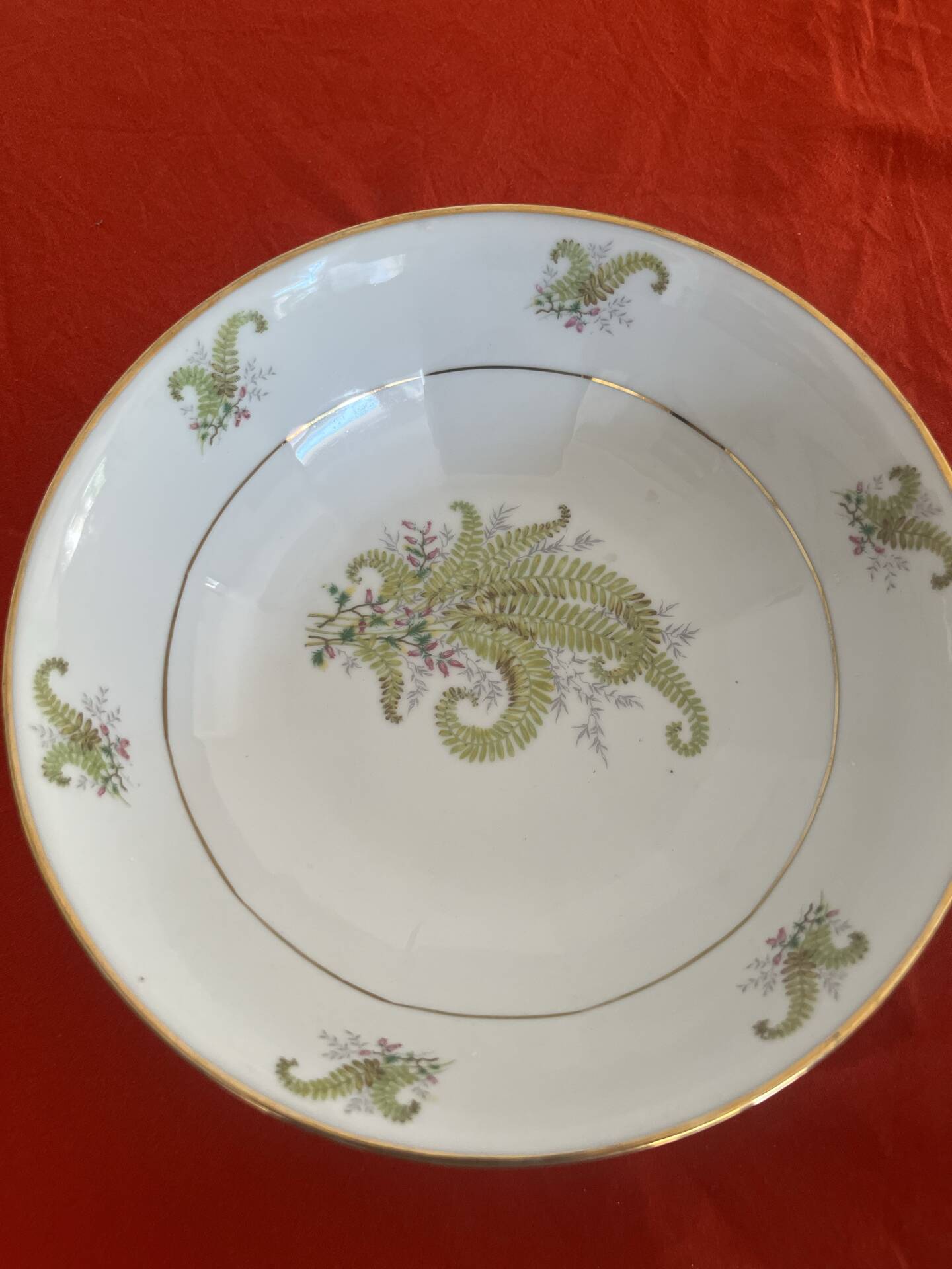 3 Limoges porcelain plates with a squirrel design.
