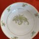 3 Limoges porcelain plates with a squirrel design.