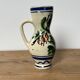 Small Korond style ceramic pitcher with floral motifs