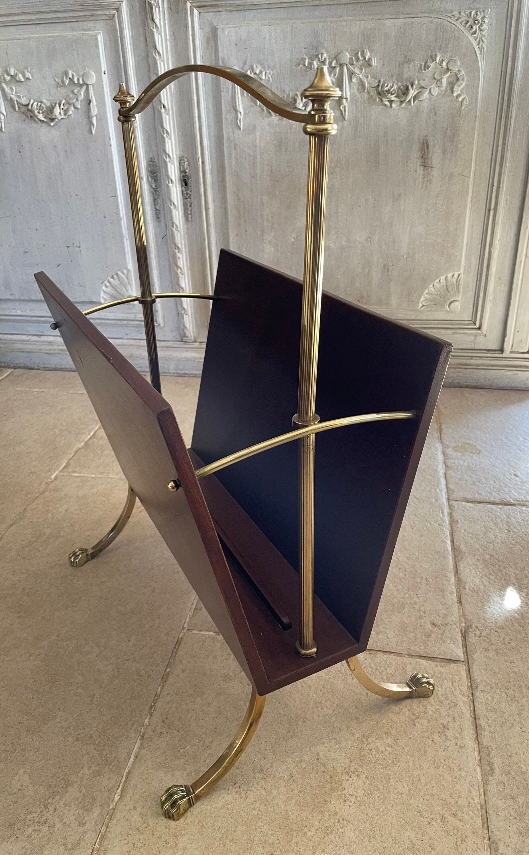 Magazine racks with claw feet by Maison Jansen