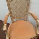 Pair of Louis XVI style armchairs in 20th century patinated beech