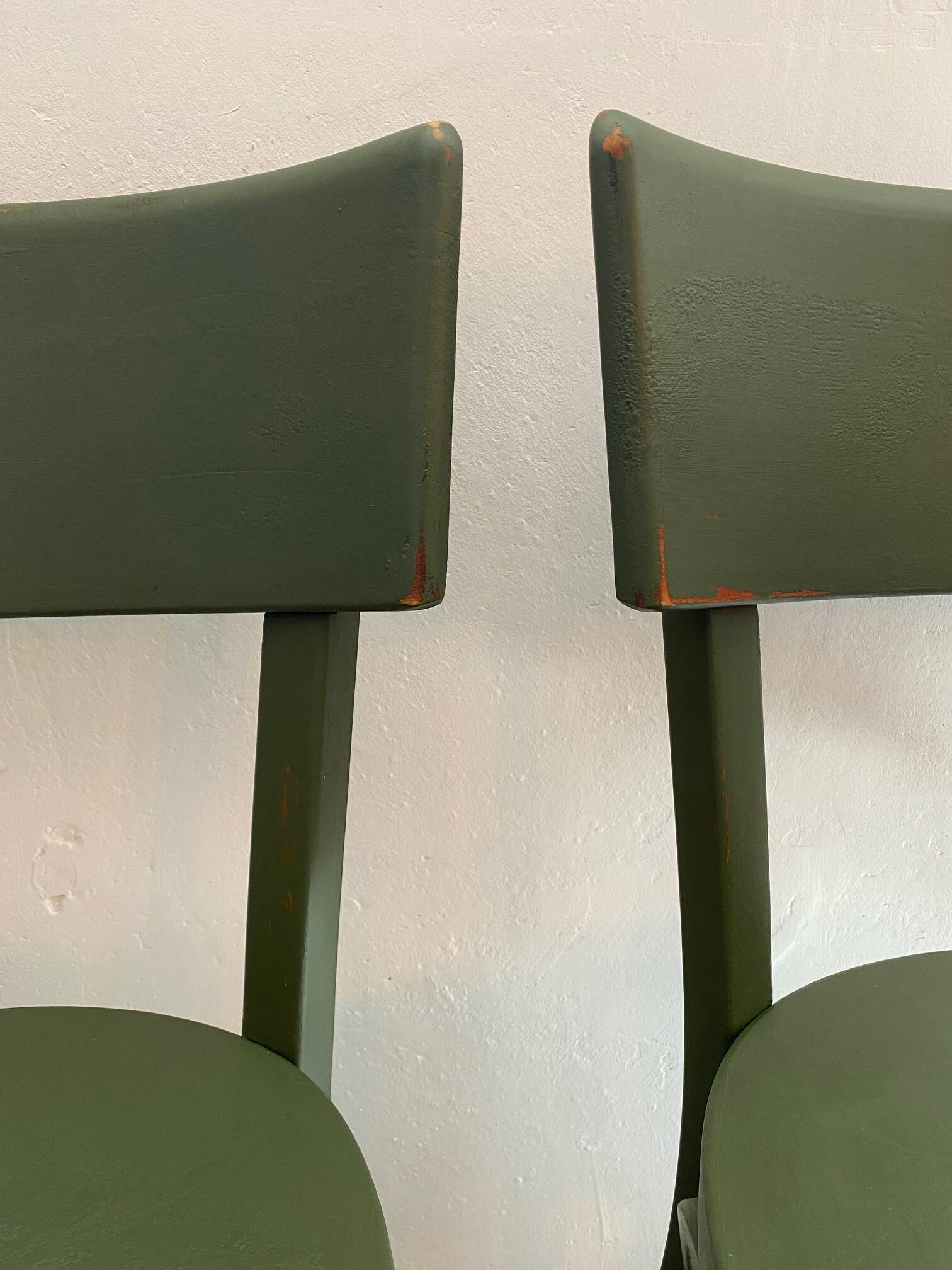 Pair of Baumann bottle green bistro chairs