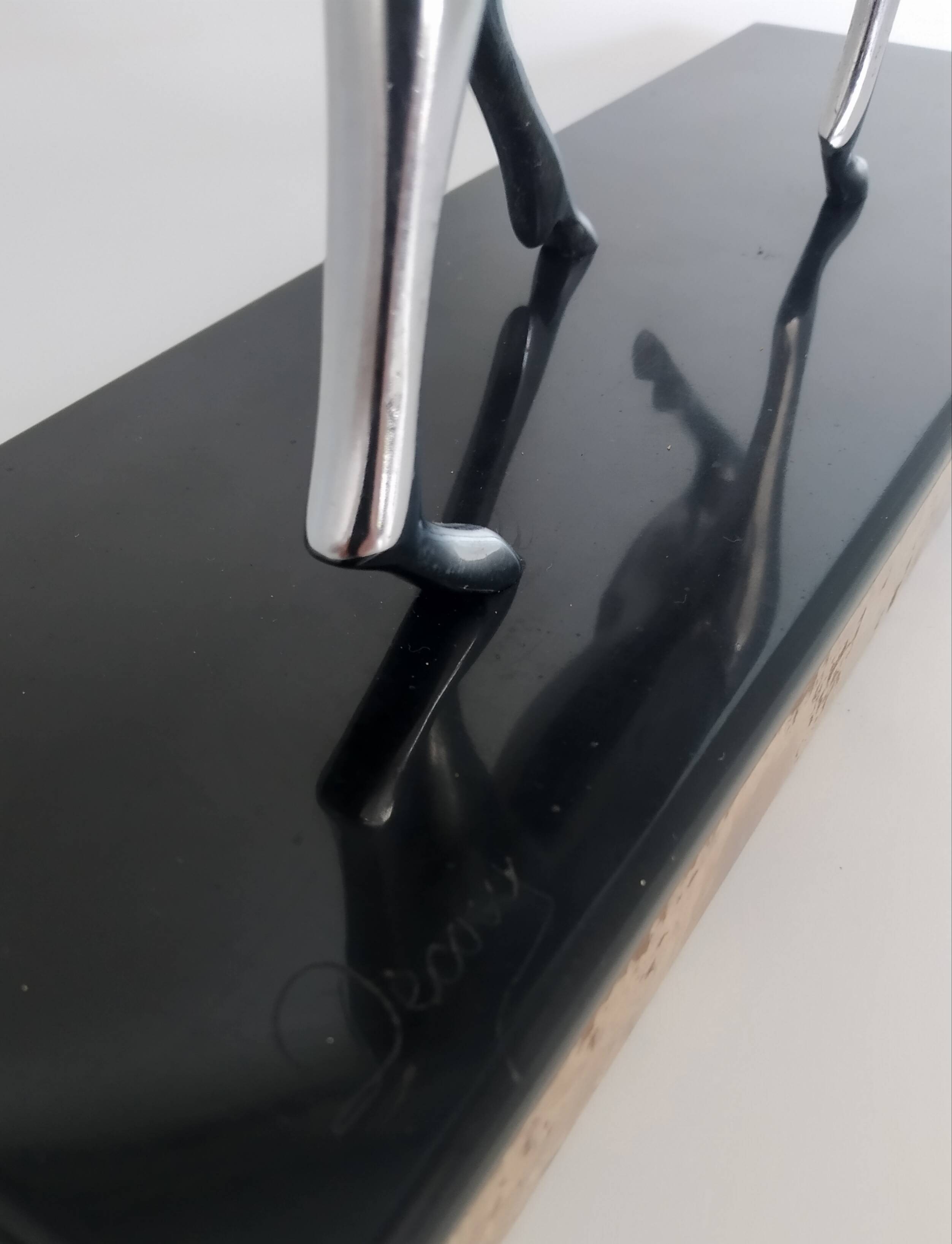 Silvered bronze sculpture signed by Michel Decoux.