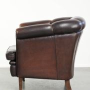 Dark sheepskin club armchair with unique design in English style