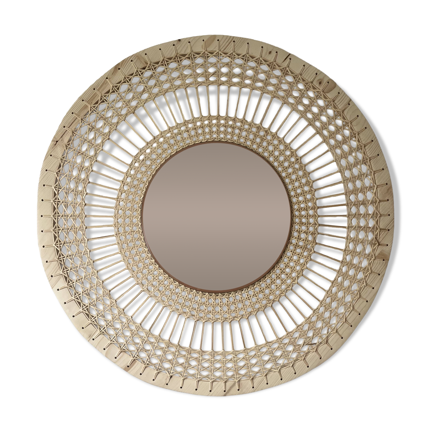 Decorative mirror in woven sun cane