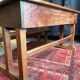 Wooden school desk with integrated bench, France, 1950s