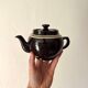 Brown ceramic teapot