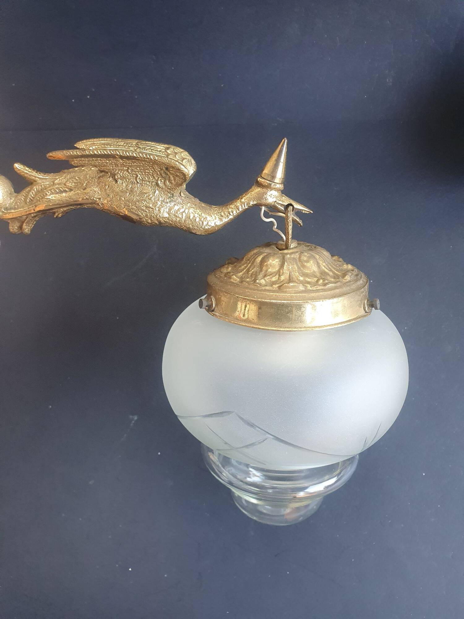 Pair of antique bronze wall sconces