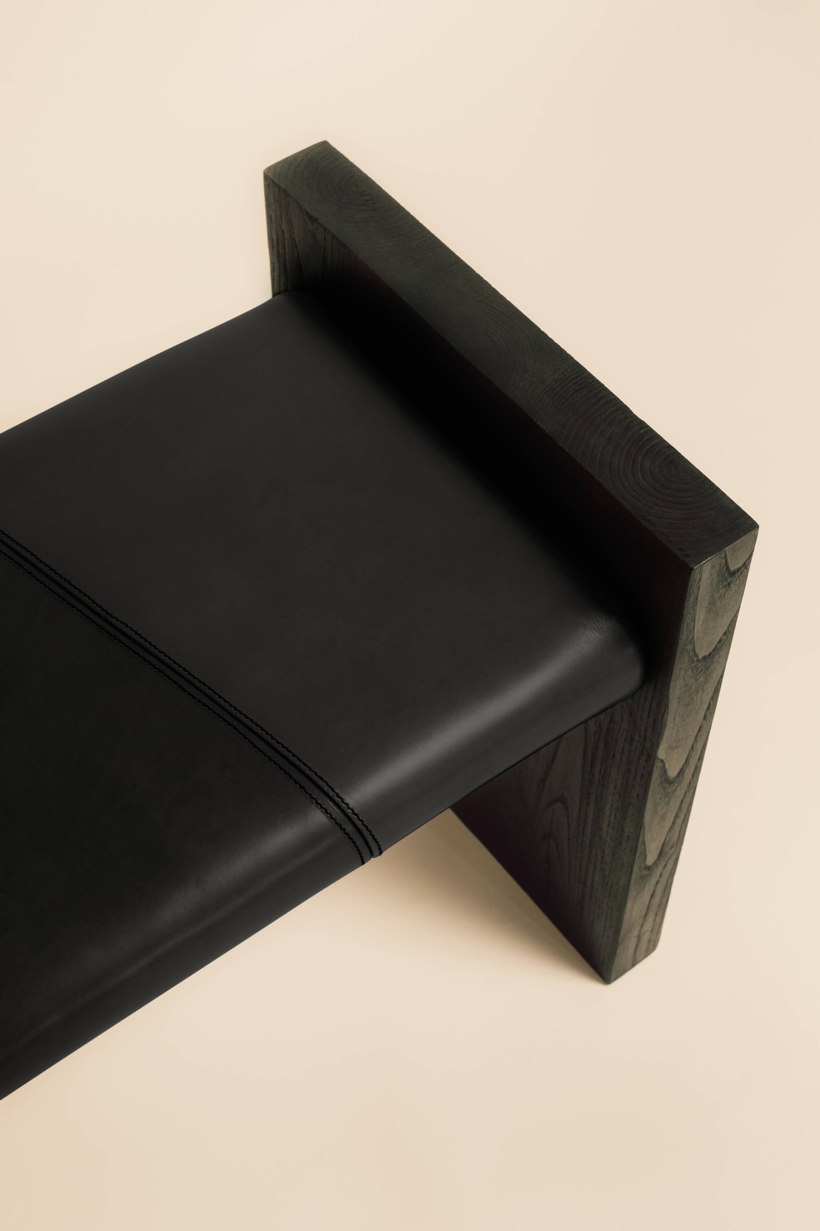 Maërl SEPIA bench, ebonized chestnut and black leather.