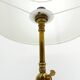 Articulated tripod lamp base in brass, Arts & Crafts style, in the manner of.