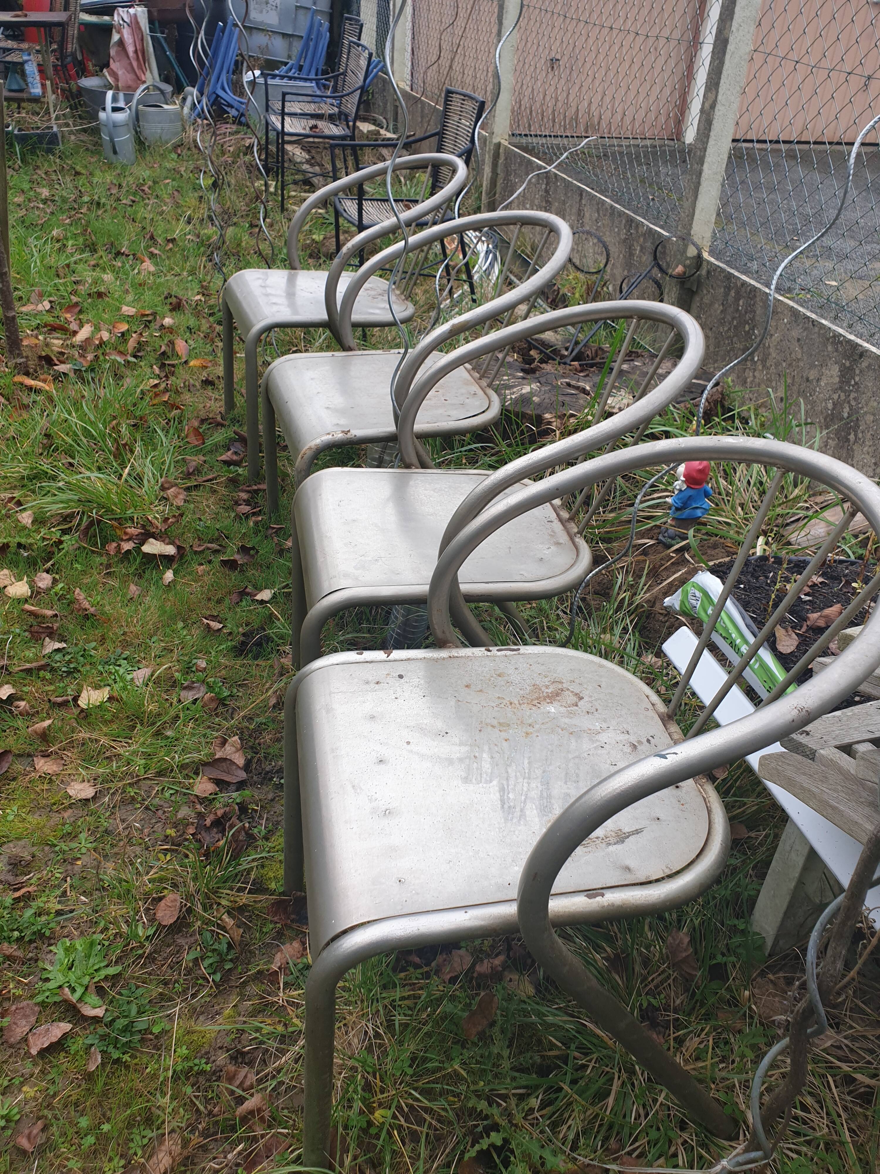 4 seventies welded tubular steel armchairs