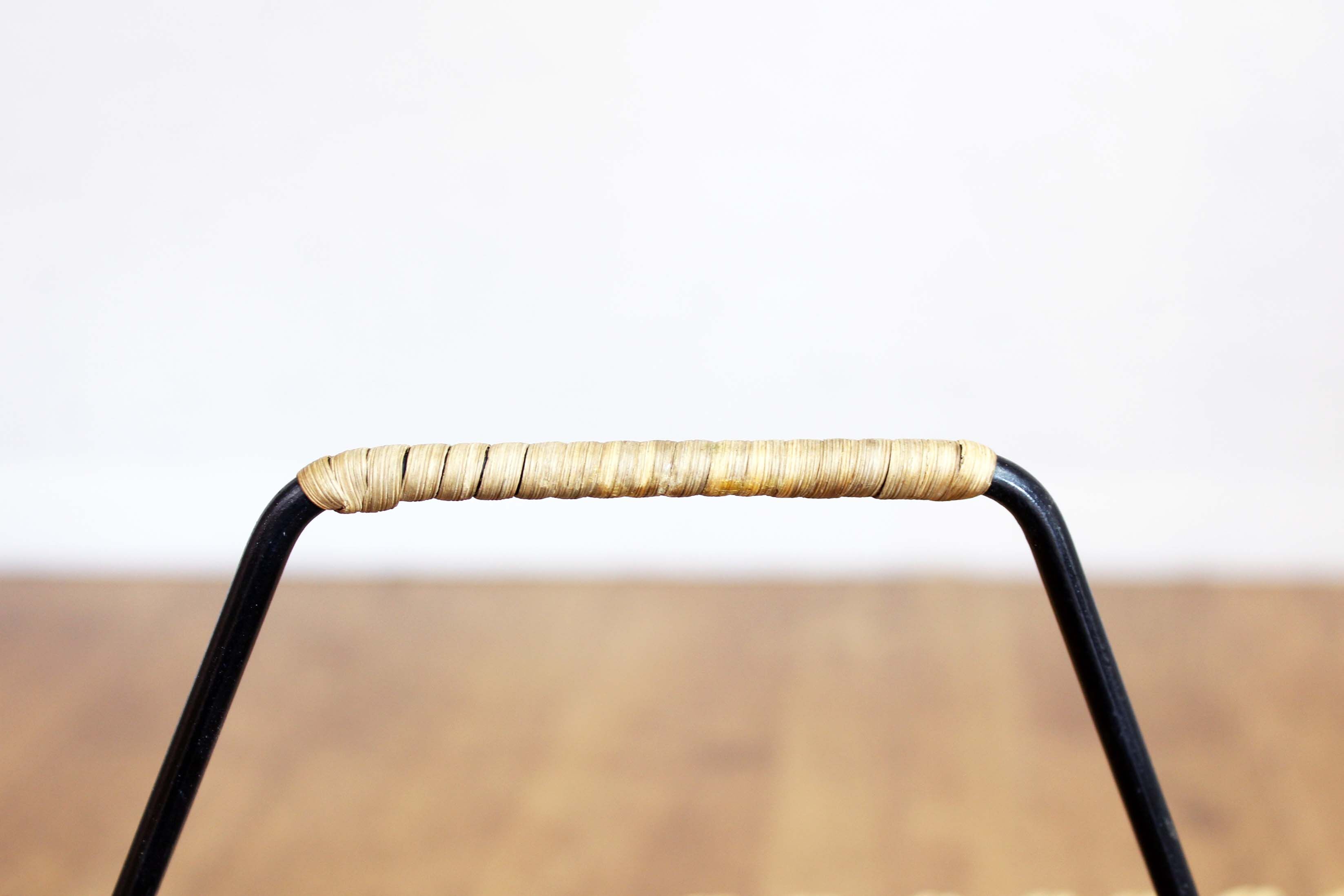 Vintage wicker magazine rack