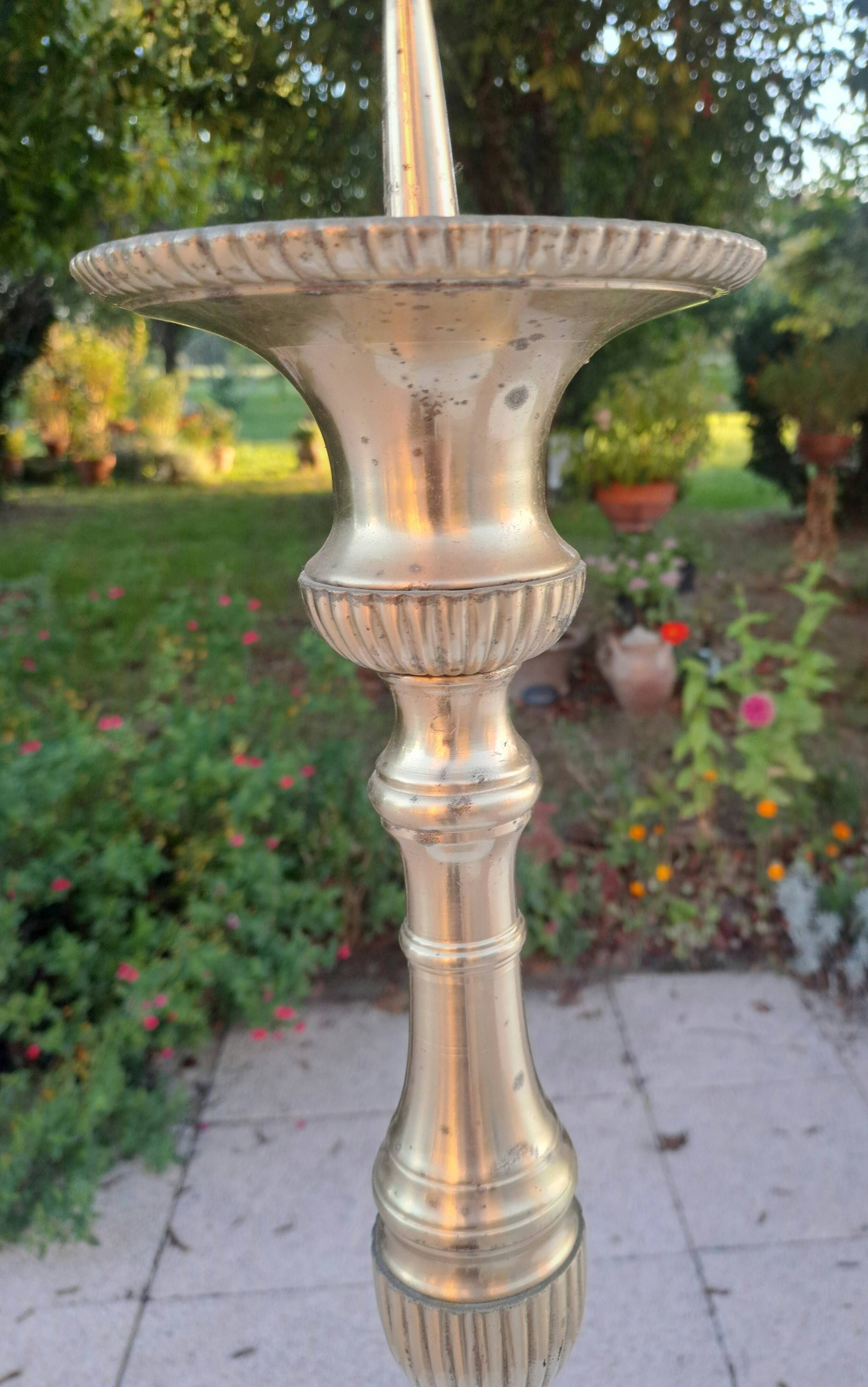 Large gilded bronze candlestick from the 19th century, height 67.5 cm.