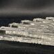 Set of 12 molded glass or crystal knife rests with diamond point decor