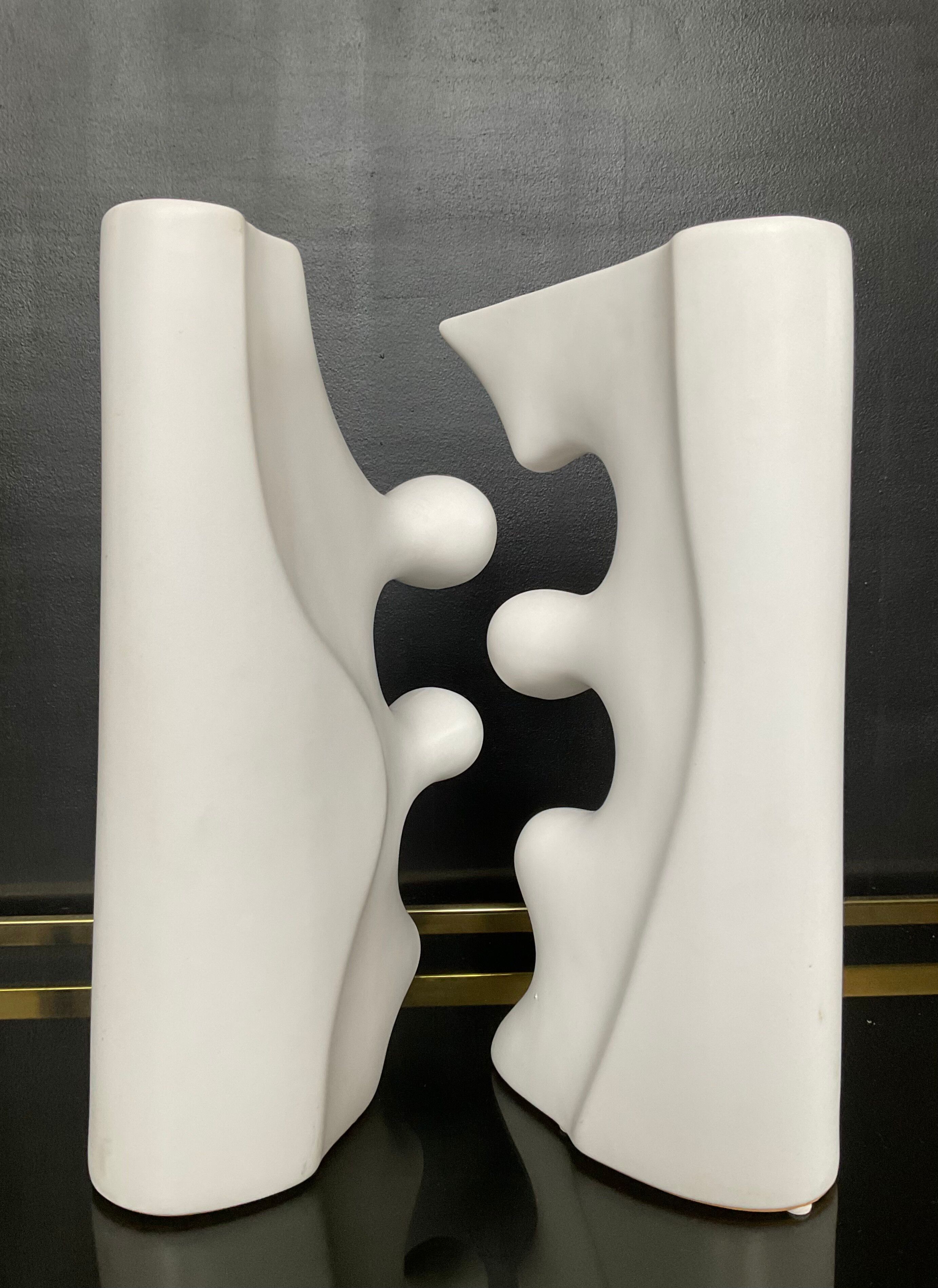 A pair of large designer ceramic vases.