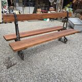 Antique double garden bench from the city of Paris in cast iron and wood