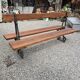 Antique double garden bench from the city of Paris in cast iron and wood