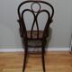 Canned armchair in curved wood signed J.Kohn