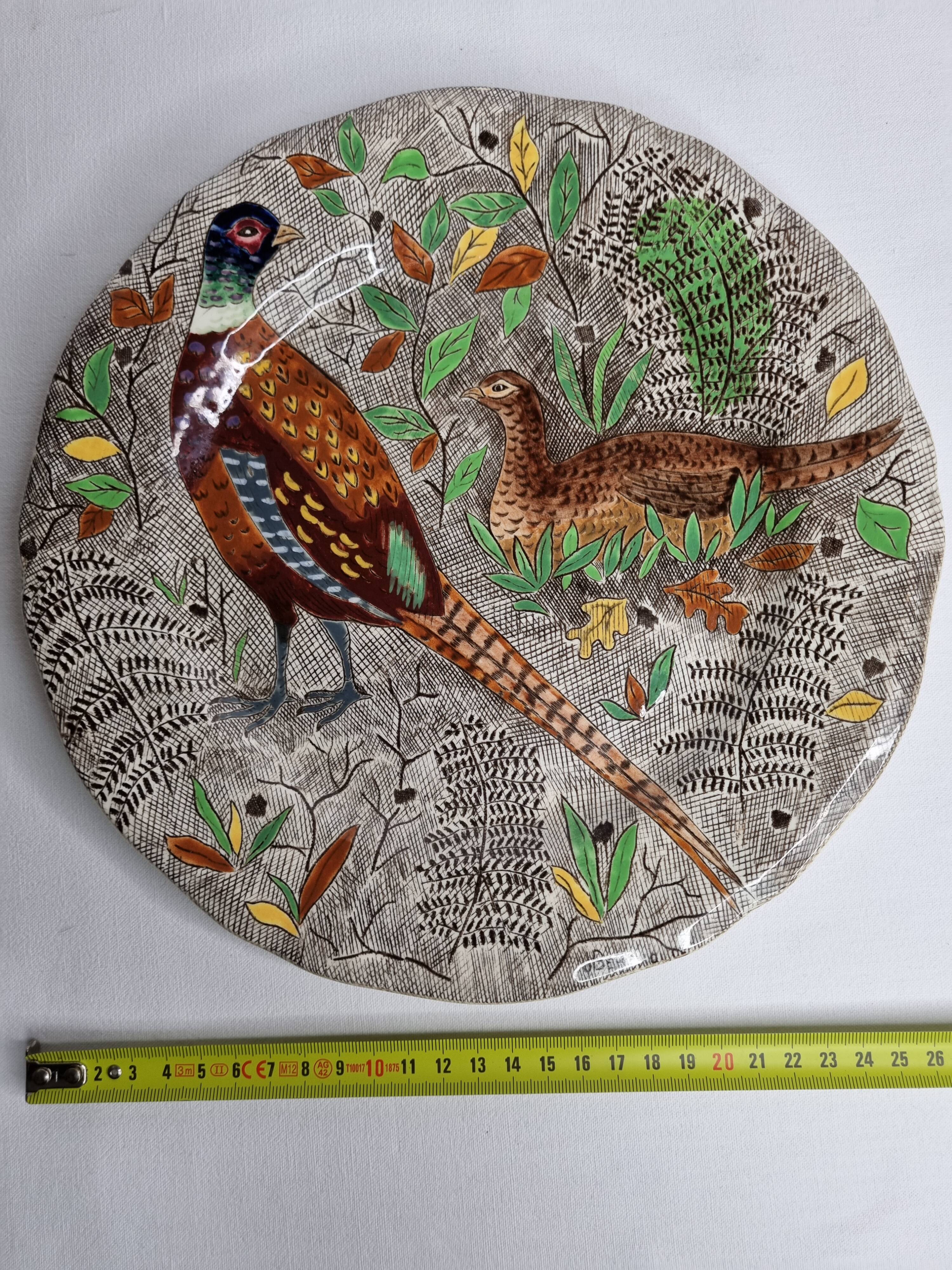 Plate in gien earthenware model rambouillet "couple of pheasants" signed in the décor, 26 cm