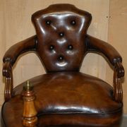 High Victorian leather tête-à-tête canapé with a walnut burr chessboard.