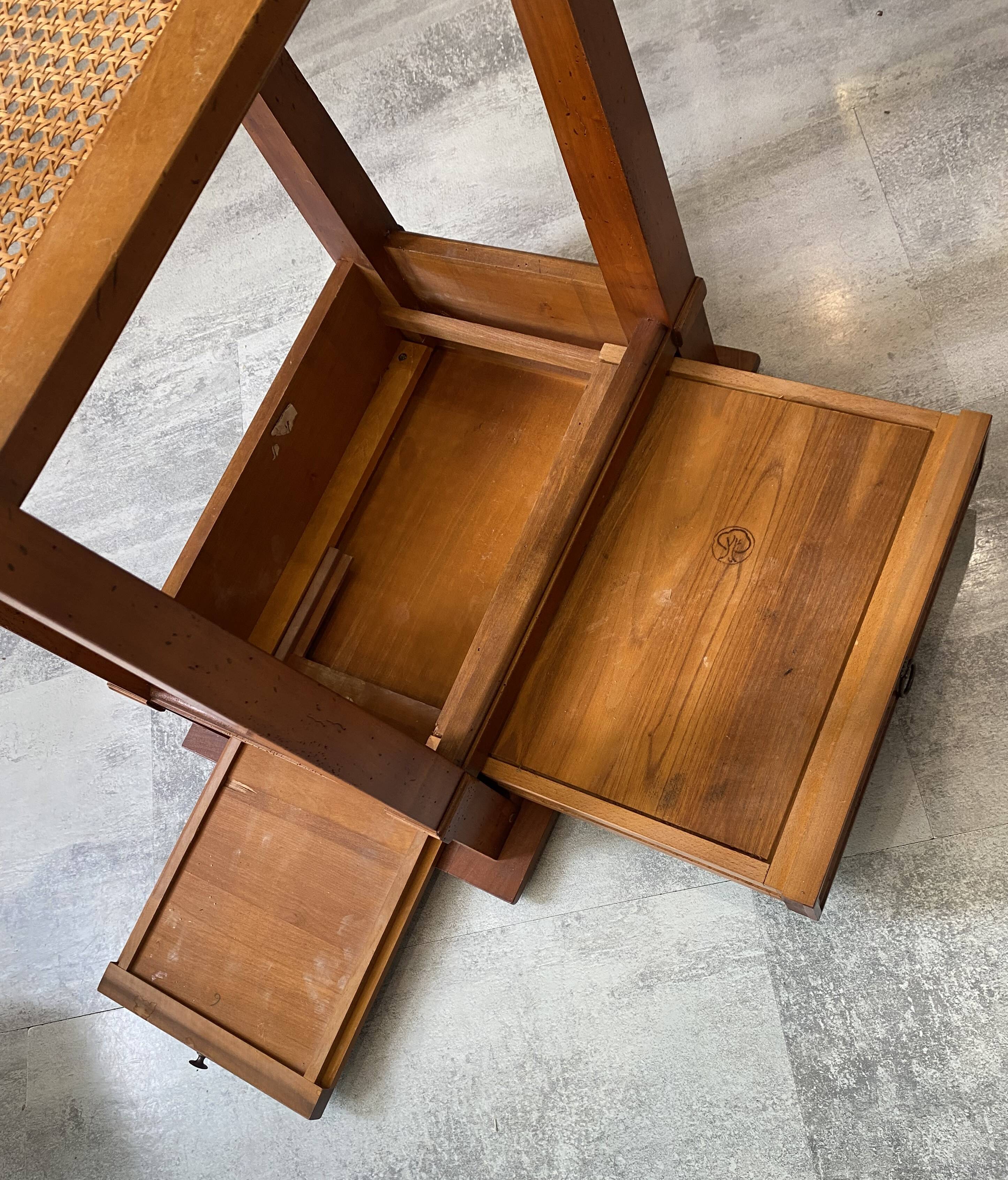 Occasional table in cherry wood, 1 drawer, 1 cane shelf, 1950.
