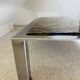 Table basse Roche Bobois en métal chromé et marbre