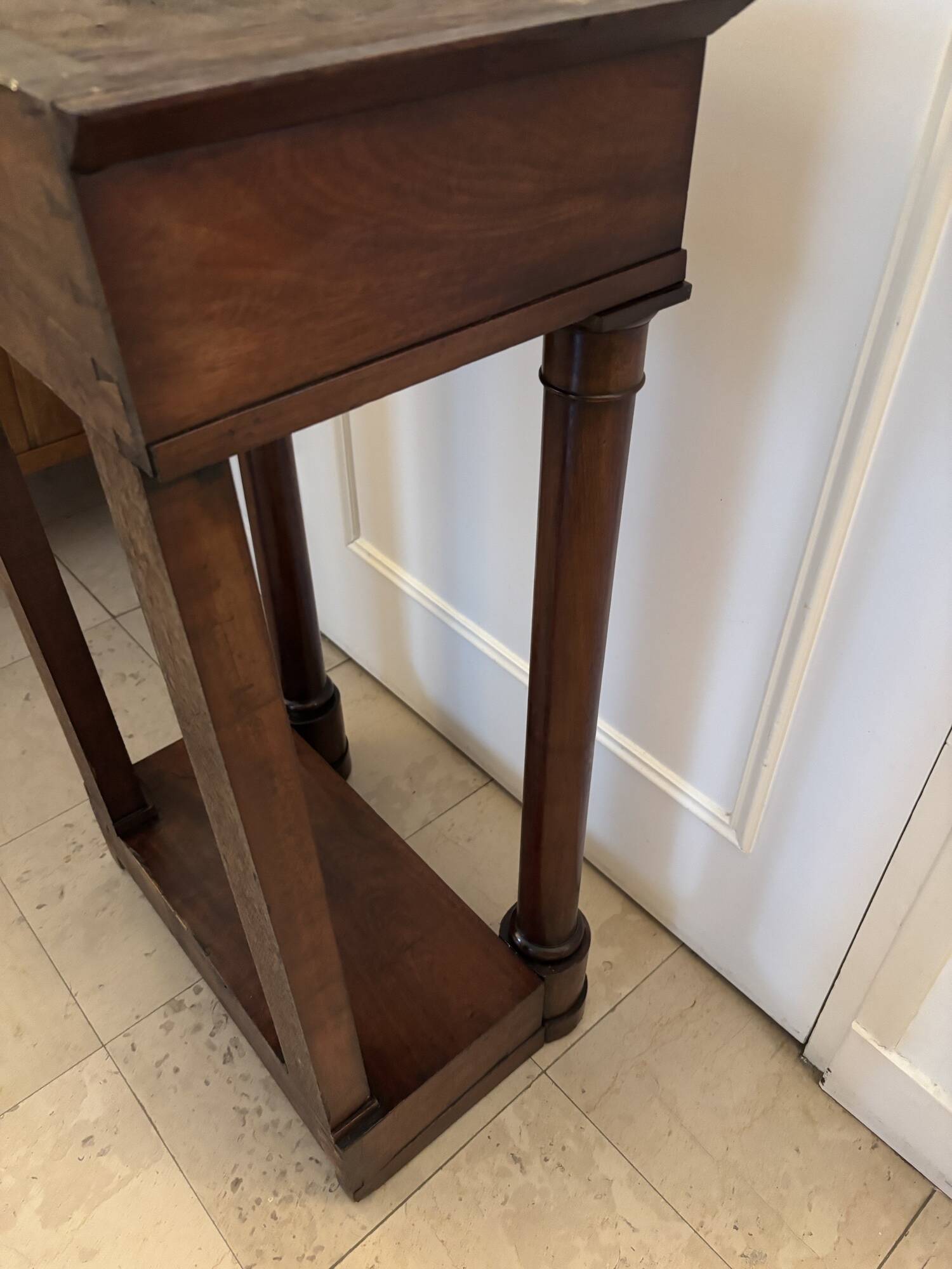 Antique small Empire console from the early 19th century in mahogany and marble.