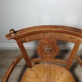 Straw armchair folk art.