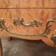 Commode galbée en loupe d'orme et bronze
