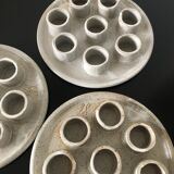 Three ceramic snail plates