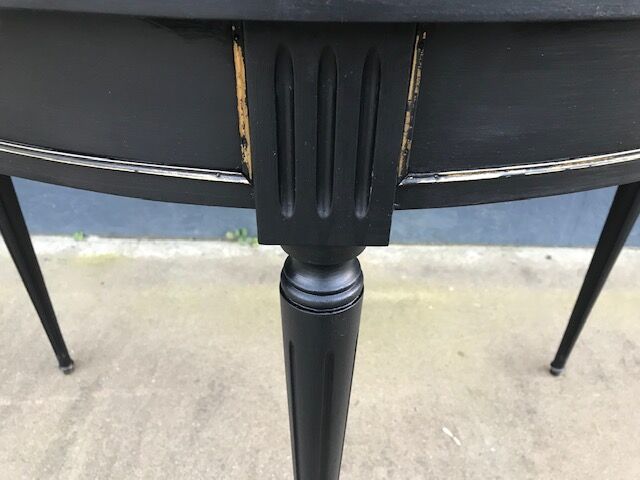 Black half moon console