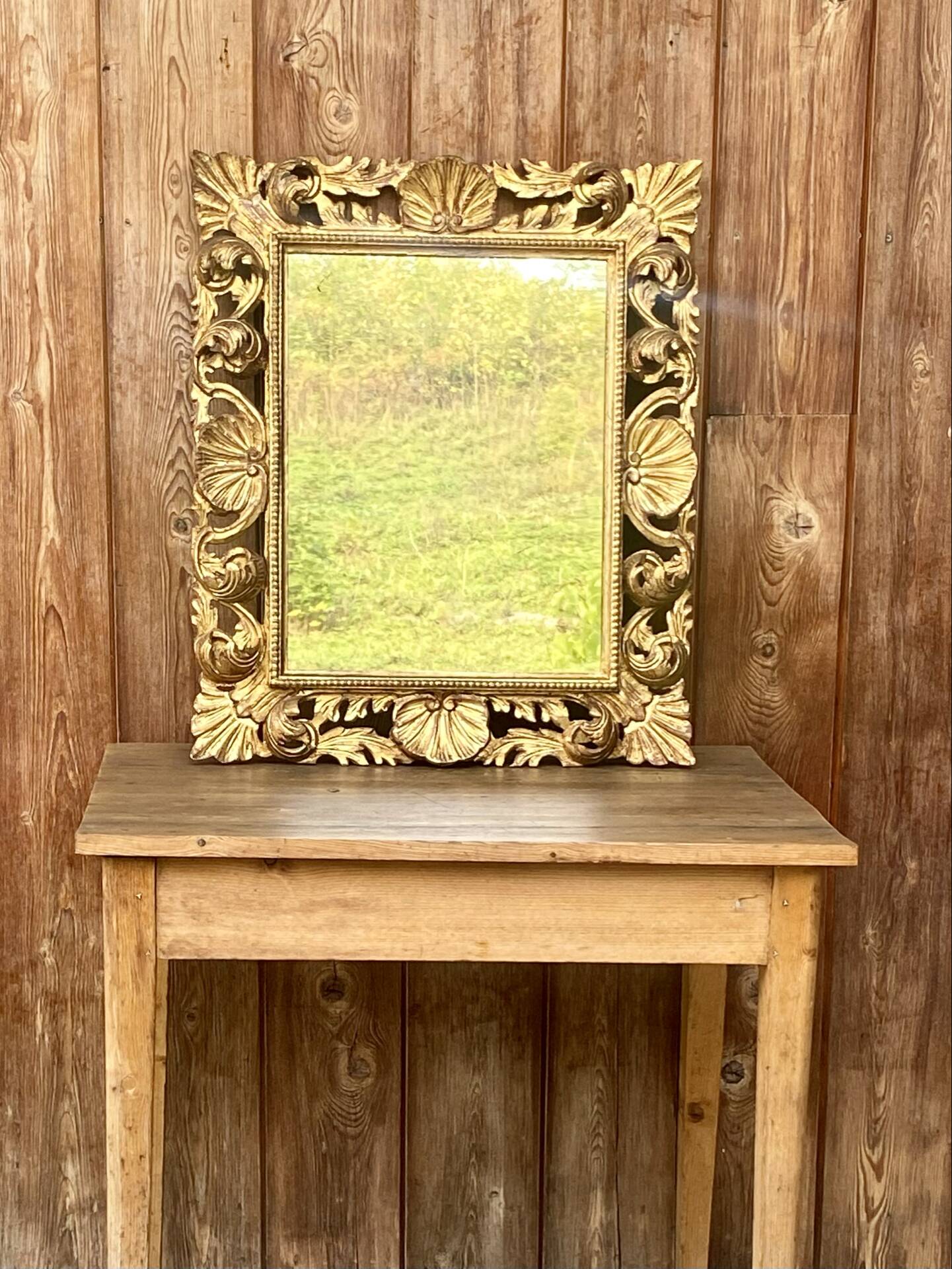 Antique mirror in carved wood