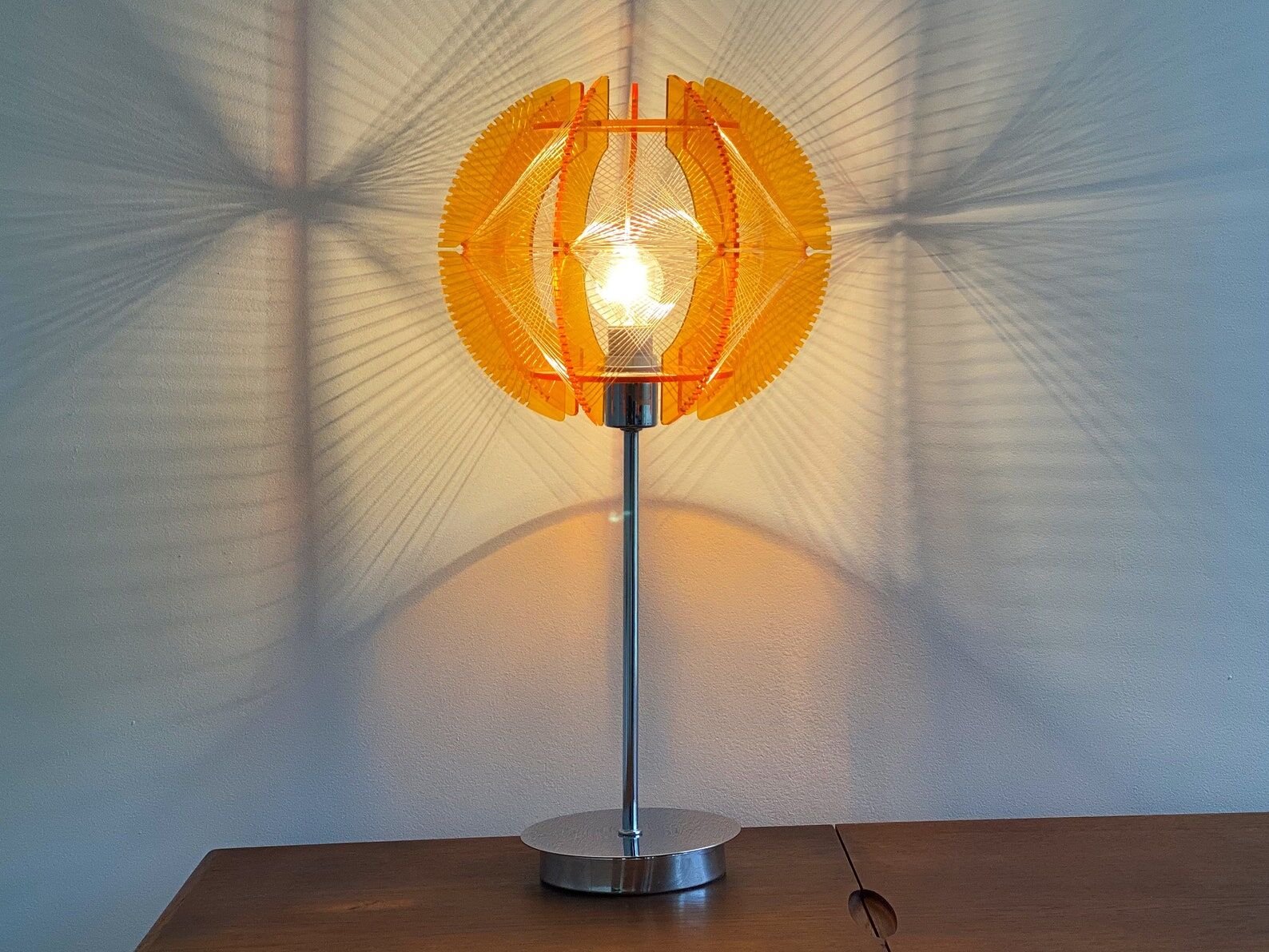 Space Age acrylic table lamp with a nylon wire thread & orange acrylic shade