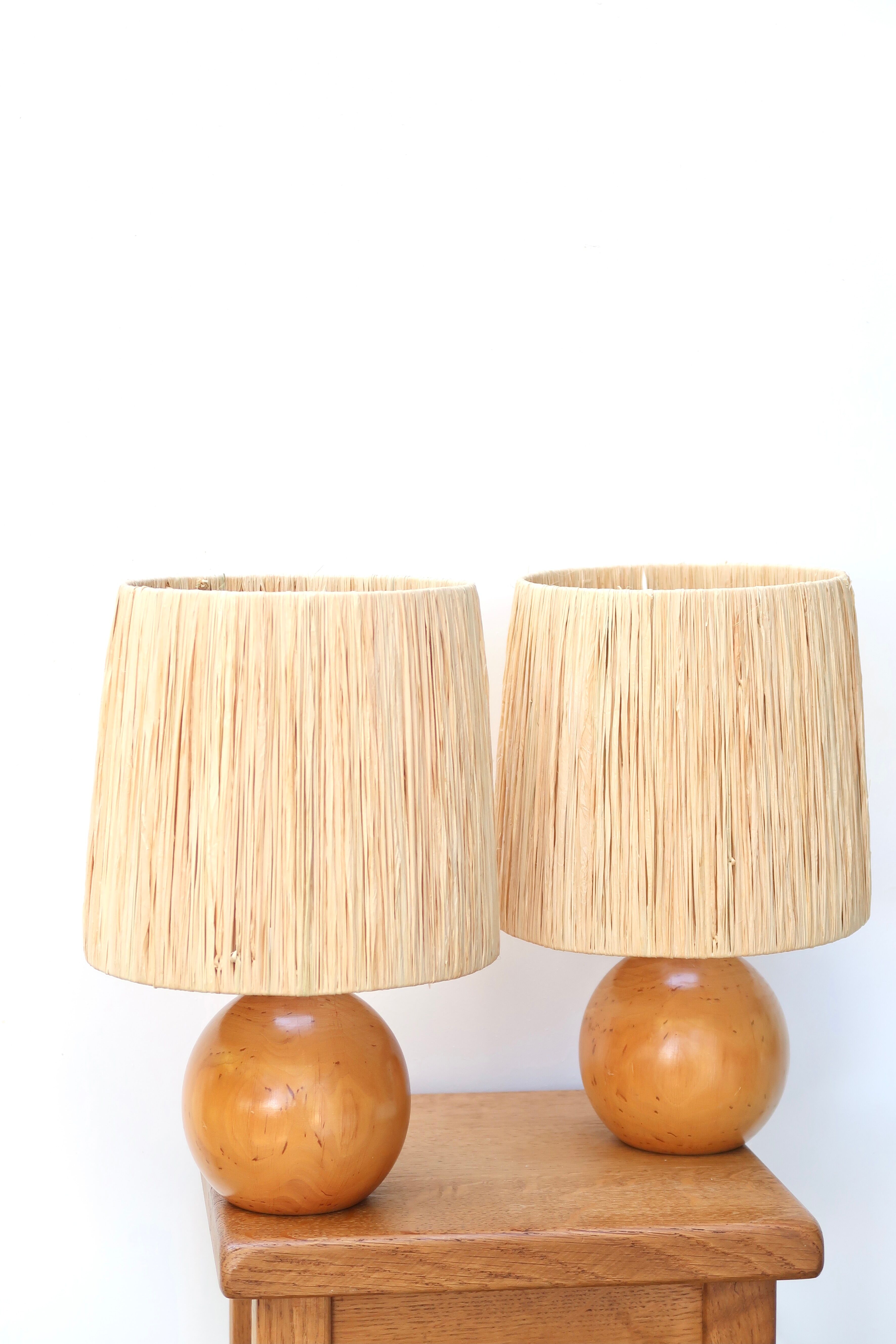 Pair of wooden lamps, raffia lampshade, 70s