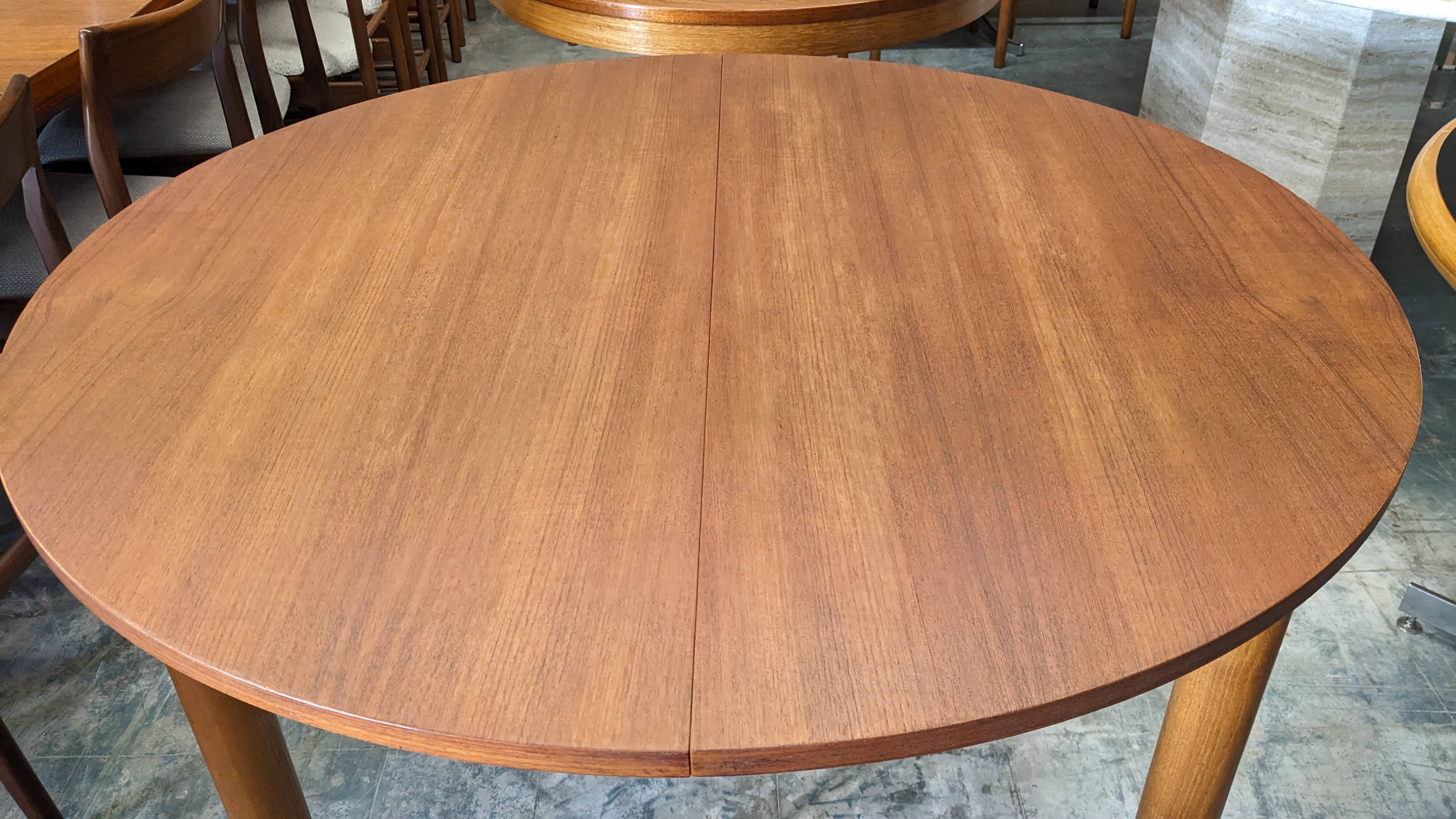 Extendable round table in Scandinavian style made of teak, France circa 1960.