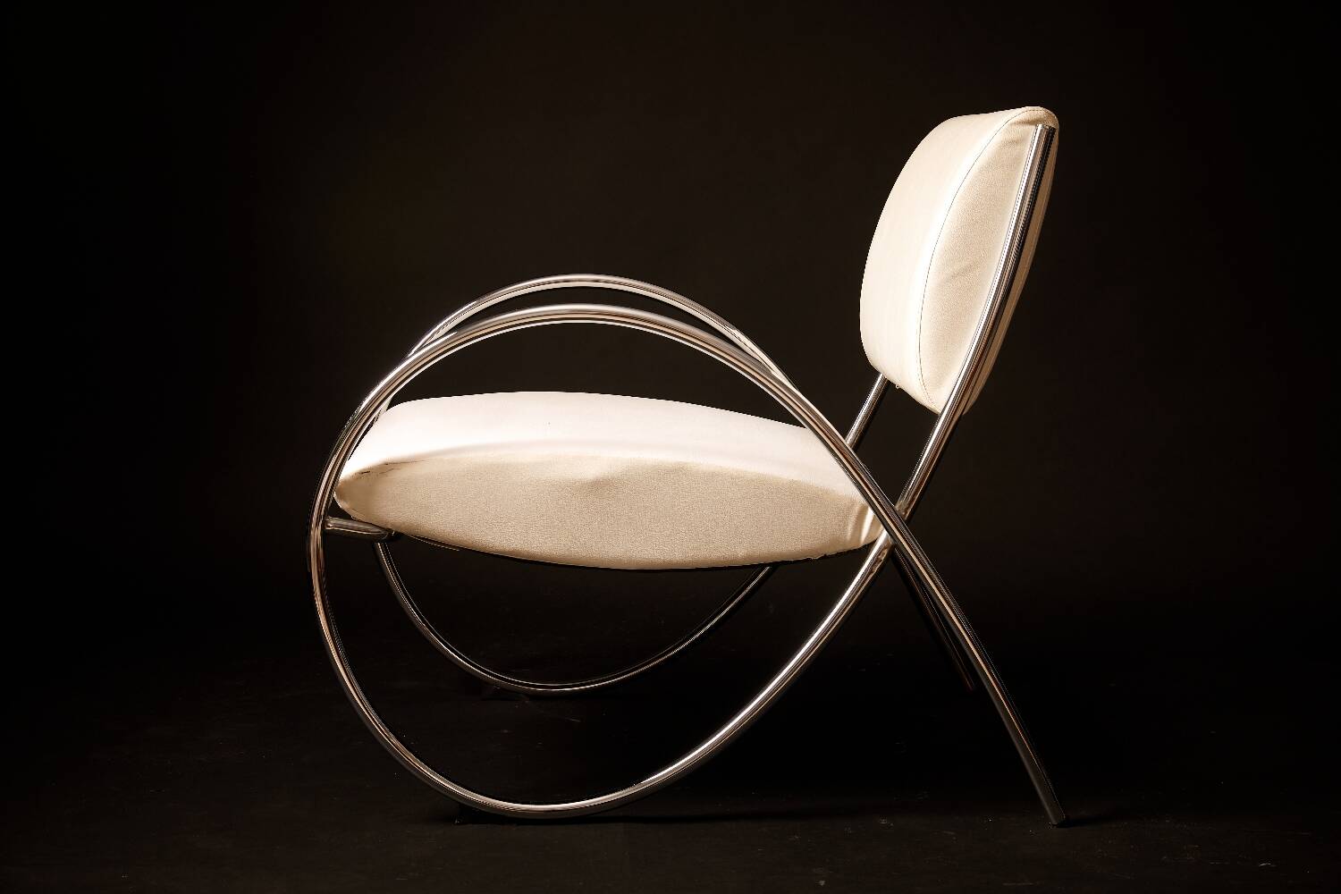 Chrome metal and white sky designer armchair