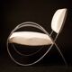 Chrome metal and white sky designer armchair
