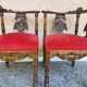 Pair of neo-Renaissance Henri II corner armchairs in carved wood, 19th century.
