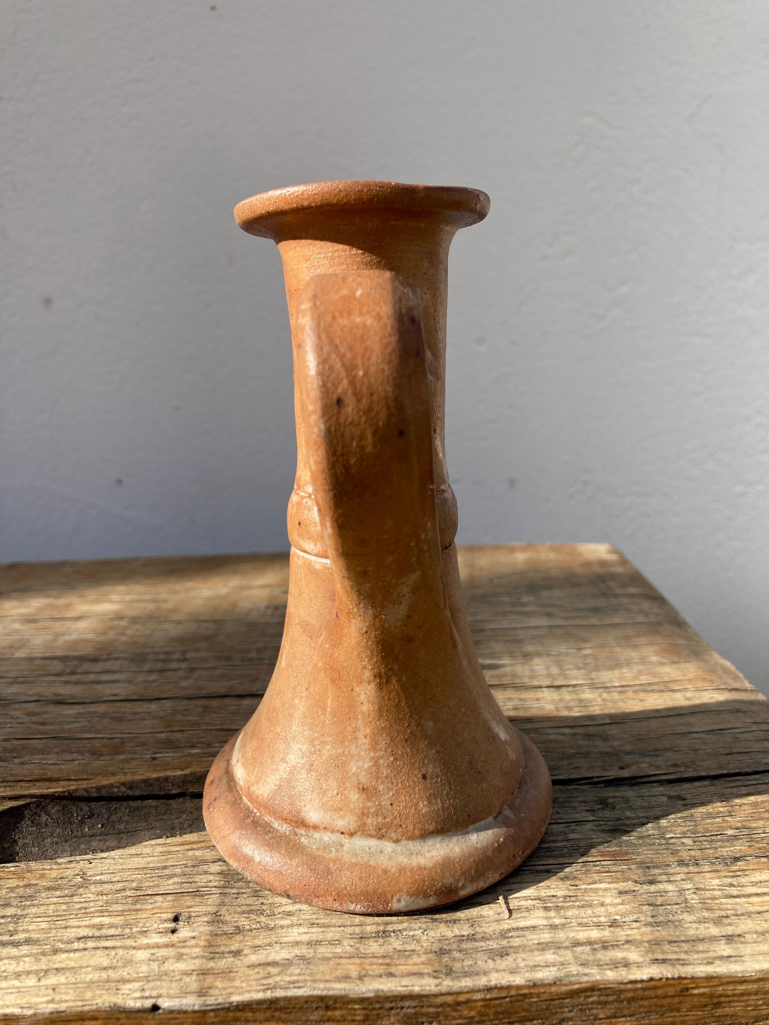 Candle holder in beige brown enamelled sandstone