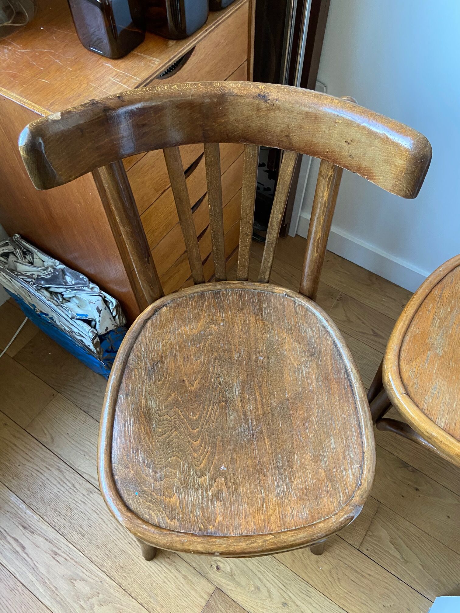 Pair of wooden bistro chairs