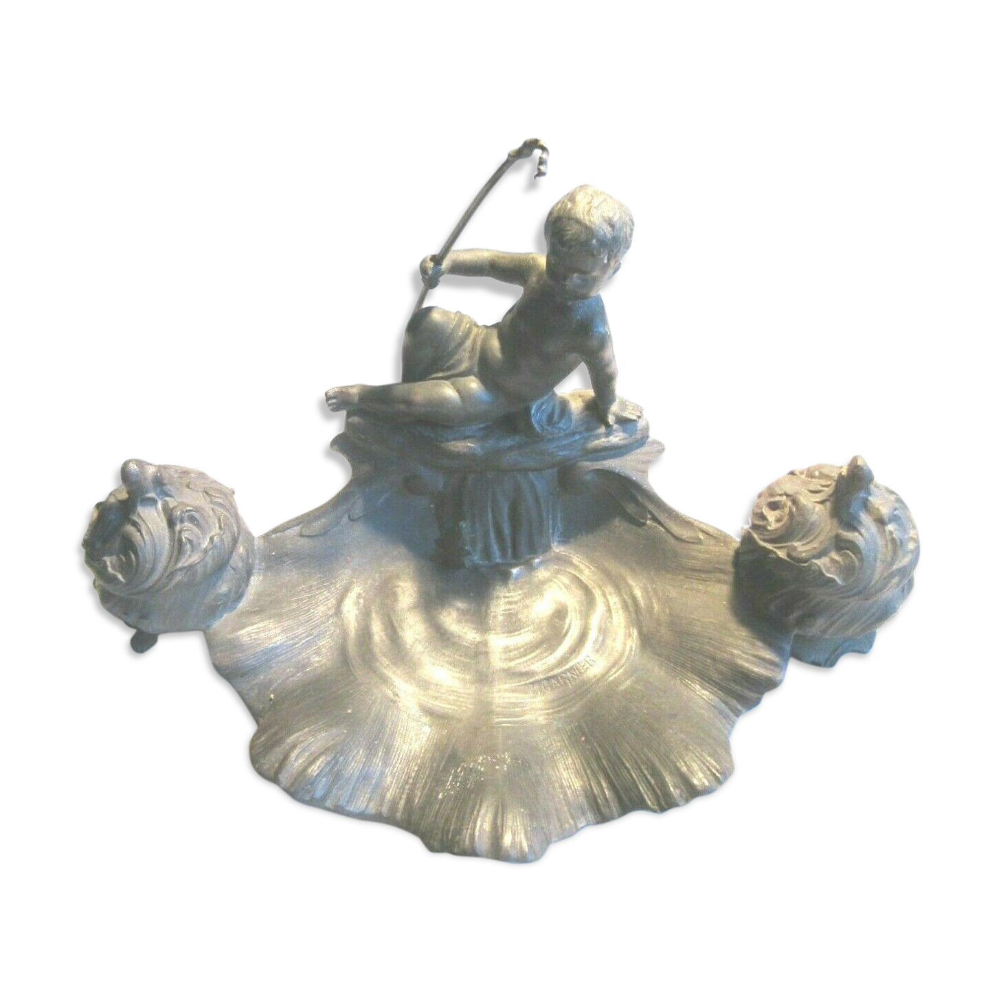 Double ink out 19th in tin signed J. GARNIER: The Cherub fisherman