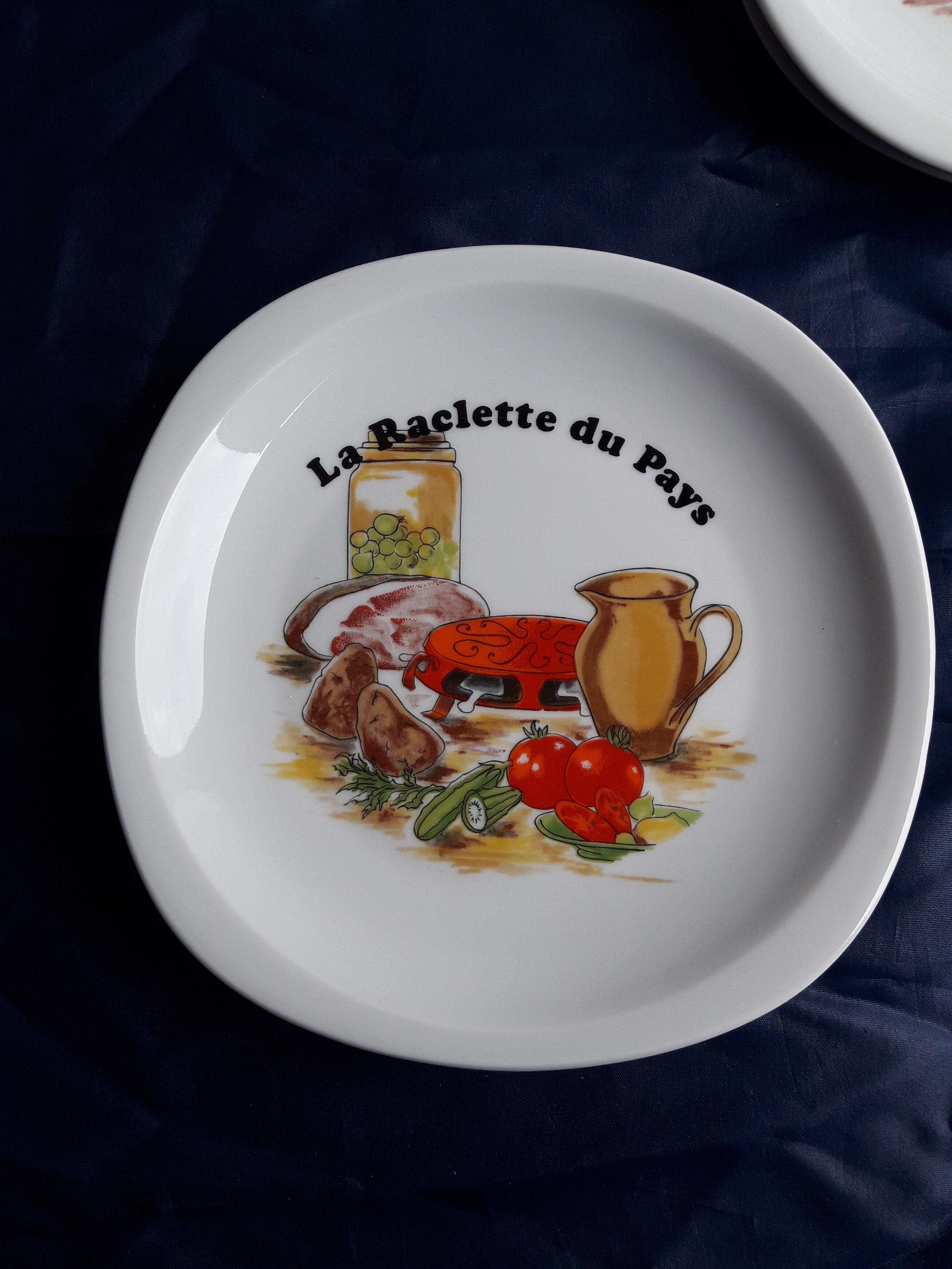 Lourioux porcelain raclette service created by Philippe Deshoulières