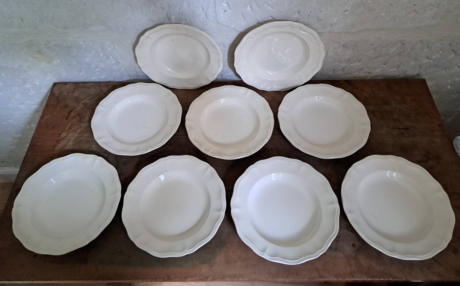 Set of 9 Sarguemines ivory soup plates