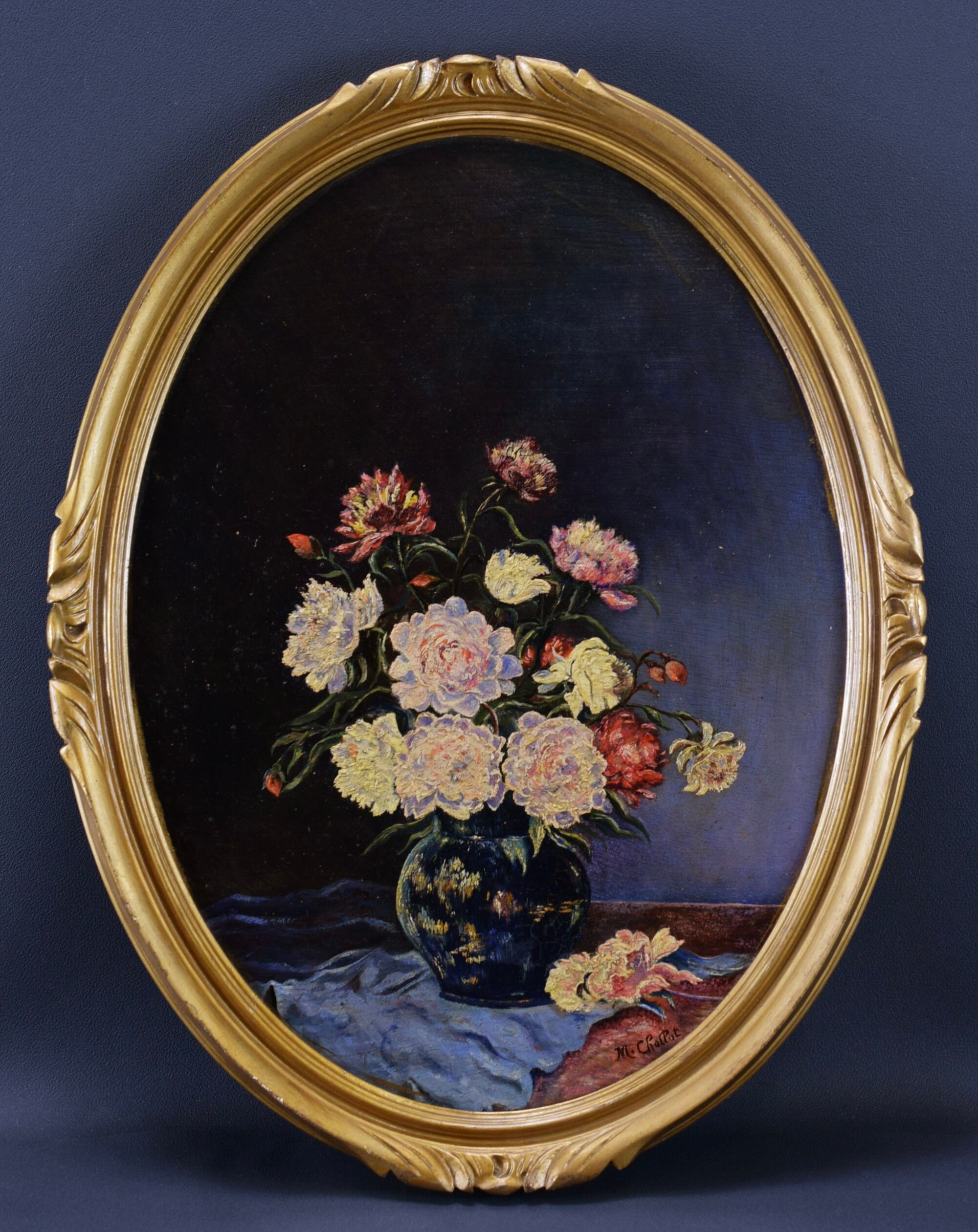 Pair of still life paintings bouquets oval golden frame
