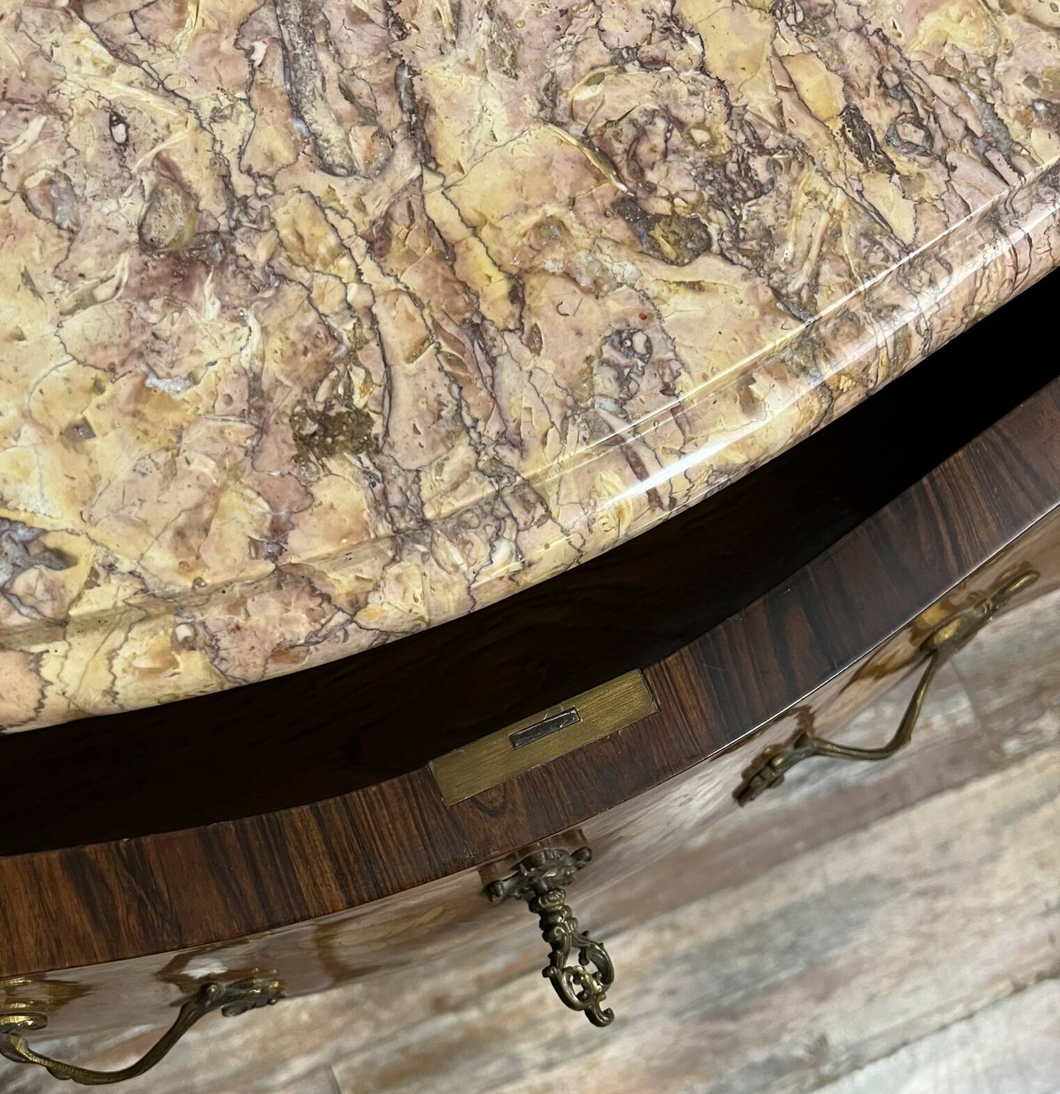 Louis XV style curved chest of drawers in marquetry