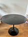 Table noire Tulipe Saarinen Knoll 90cm en marbre