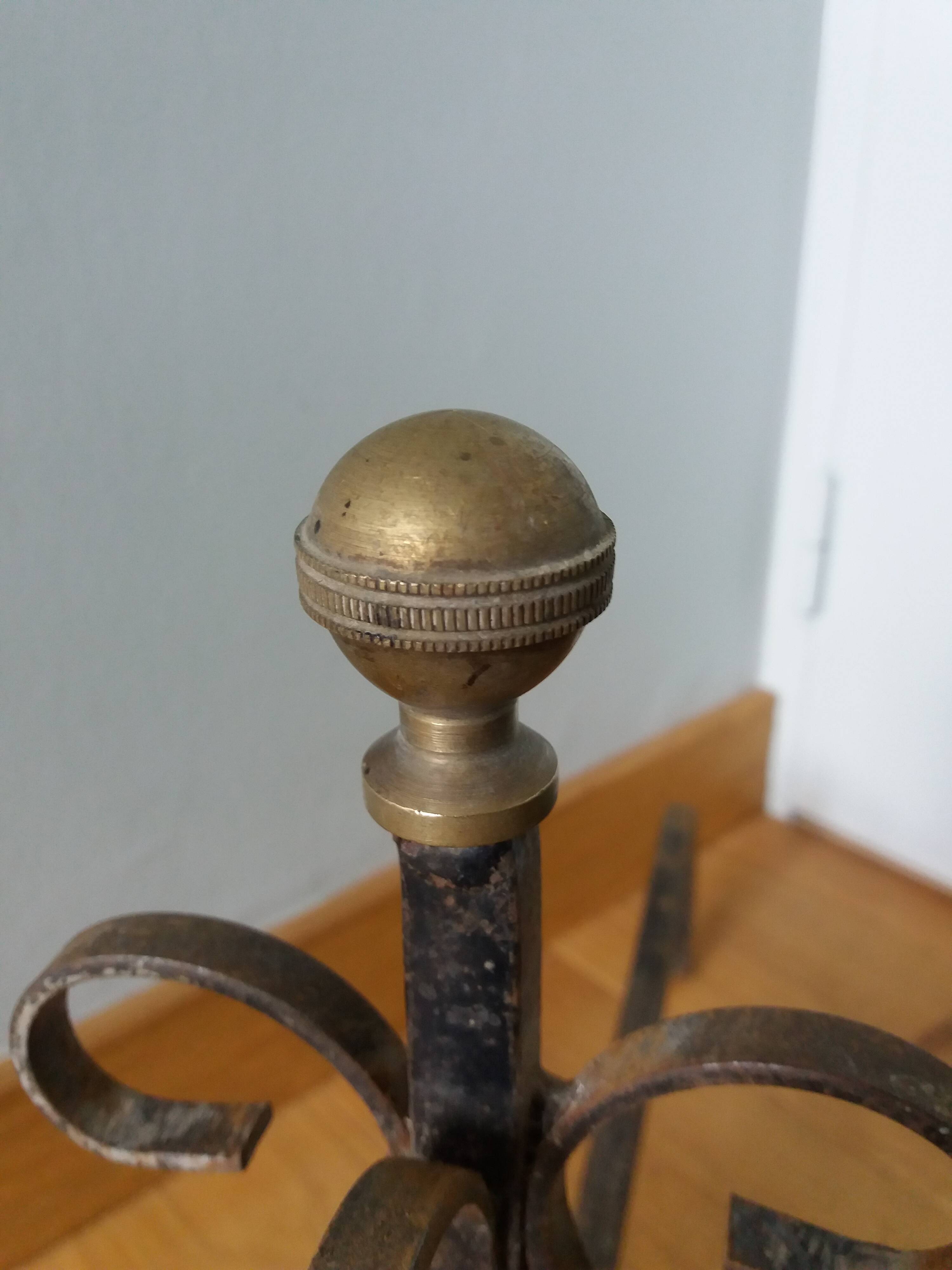 Chenets tête boule bronze doré
